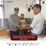 Bhabinkamtibmas Polsek Siantar Utara Dampingi Pendistribusian Paket Progam MBG di SMK N 1