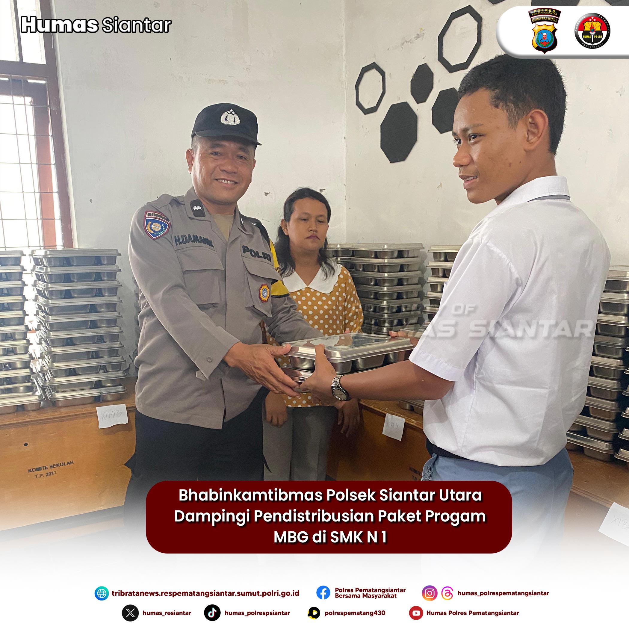 Bhabinkamtibmas Polsek Siantar Utara Dampingi Pendistribusian Paket Progam MBG di SMK N 1
